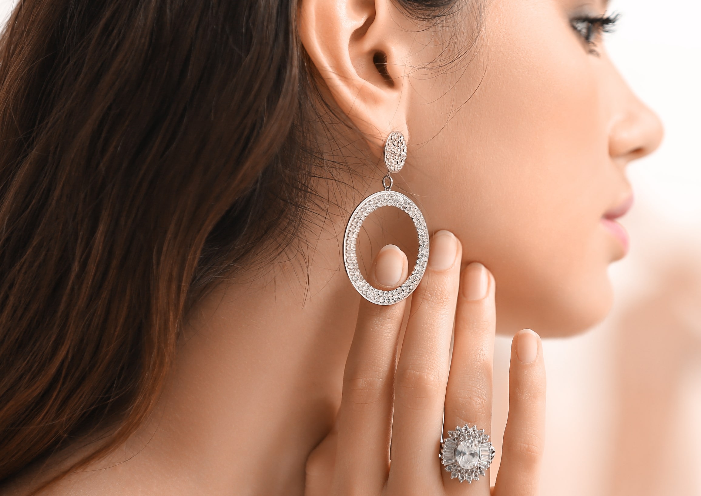 Woman Wearing a Pair of Earrings